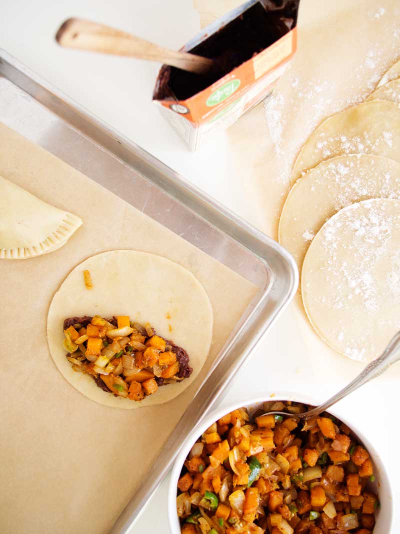 Butternut Refried Black Bean Empanadas | thekitchenpaper.com